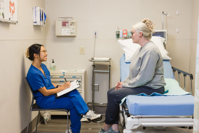 Nurse speaking with patient