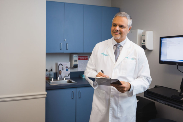 Smiling doctor in lab coat