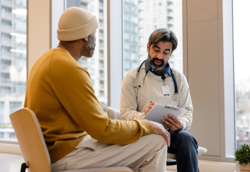 Doctor Performing a Colon Cancer Screening Test in a Clinic in Atlanta, Georgia