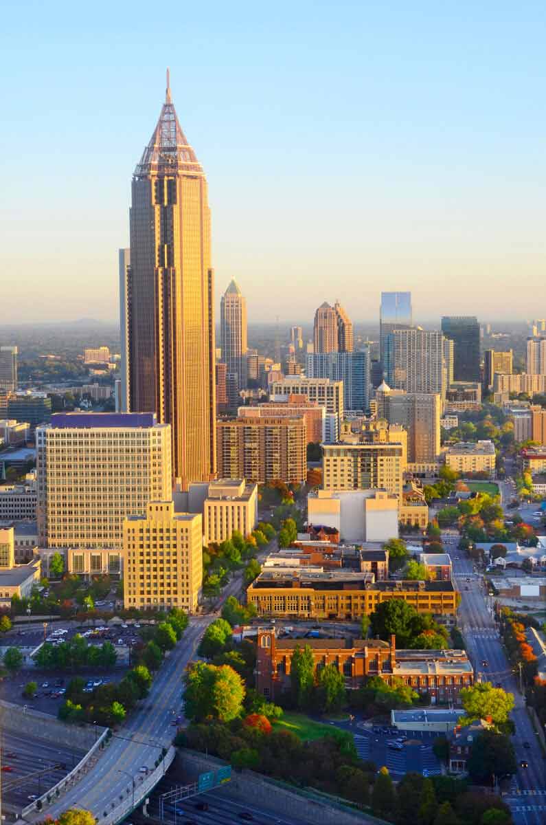 Aerial view of a hospital in downtown Georgia, surrounded by the cityscape in Towne Lake, GA